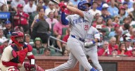 Busch hits a 3-run homer, Shaw adds a solo shot as the Cubs rout the Cardinals 9