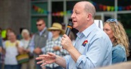 Polis cuts spending on Medicaid, higher education and grants to plug hole in state budget