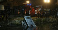 At least 18 dead and nine injured after bus plummets from bridge into river