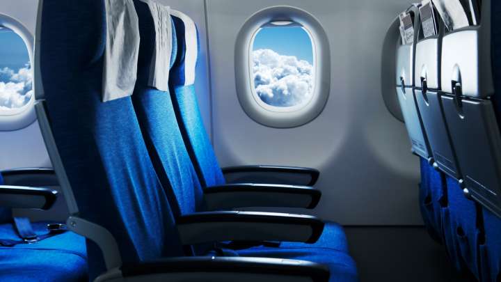 Secret life-saving reason behind the holes left in airplane windows – and feature that stops you falling