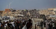 Armed group posing as aid workers targeted in Israeli strike, Israel says, as international calls mount for more Gaza aid