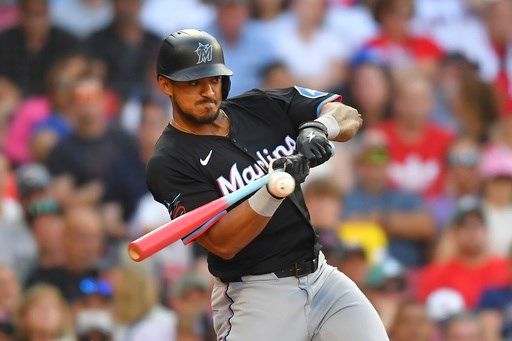 Marlins' Dane Myers gets heckled by fan at Fenway Park. He hits tying homer and fan ejected