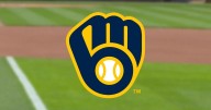 Brewers' Chourio nearly connects on first pitch in return from IL but Toronto's Straw saves HR