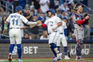 Kirk, Gimenez hit home runs to power Blue Jays to 10