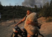 Wildfires kill at least 3 and displace thousands across southern Europe