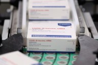 FDA approves updated COVID-19 shots with limits for some kids and adults