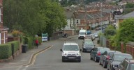Exeter road blocked due to car on fire
