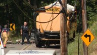 One player in critical condition after bus crash injures dozens