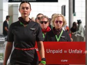How much work are Air Canada flight attendants not getting paid for?