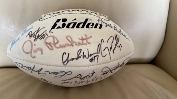 Football signed by Desmond Howard, 24 Heisman winners auctioning to support veterans