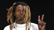 Lil Wayne stops show to congratulate 'Traylor'