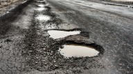 Massachusetts governor signs nearly $1.2 billion road funding bill