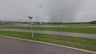 Reckless driver arrested for crashing near group playing football