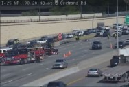 Box truck rollover on I-25 causing delays, 1 sent to hospital