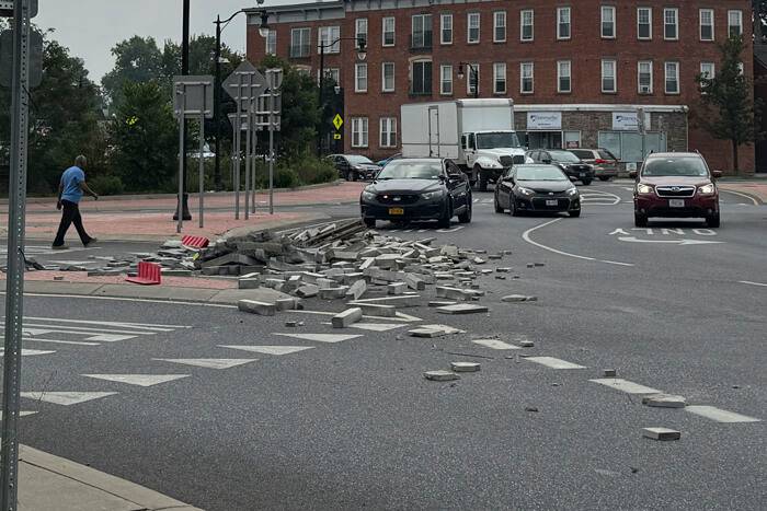 Trailer dumps load of stone into Kingston traffic circle, blocking traffic