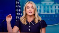 Karoline Leavitt Can't Stop Primping Herself At The Podium (We Get It, You Went Tanning)