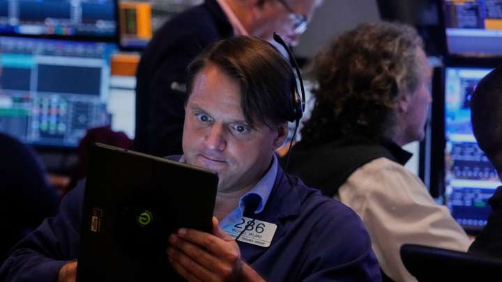 World shares are mixed in quiet trading as traders await cues from the Fed