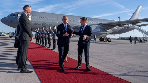 Carney's Germany visit includes shipyard tour as Canada shops for new fleet of subs