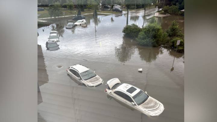 Residents in shock after several vehicles submerge under water during flash flooding