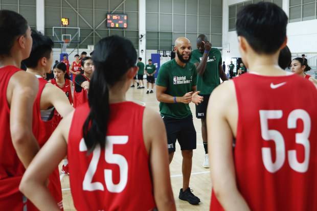 Warriors’ Khalid Robinson journeys to Singapore, teaches basketball’s next generation