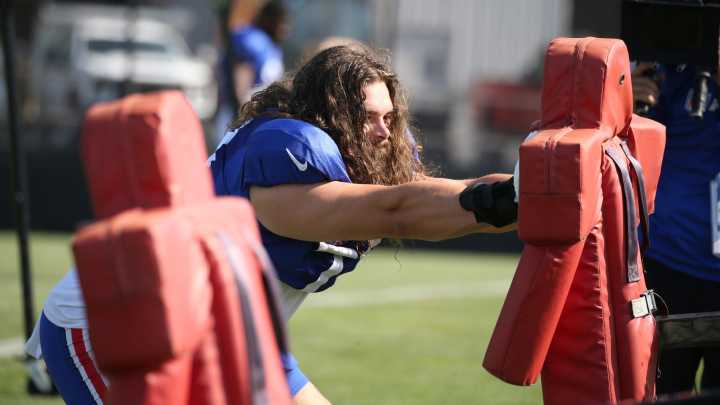 He hasn’t cut his hair in 7 years — and he won't if he makes the Buffalo Bills roster