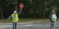 Crossing guard finds keeping kids safe even more rewarding than expected