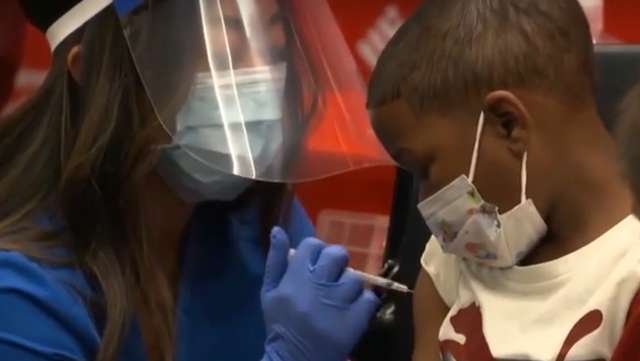 Guidance varies on when to give kids COVID