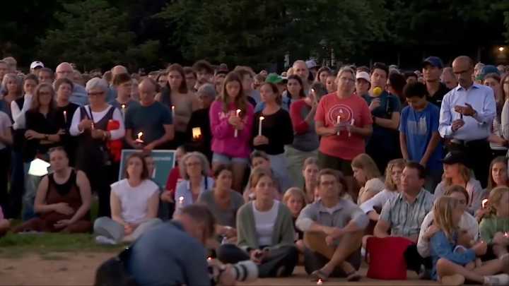 Hundreds honor 2 children killed and 17 people wounded in shooting at a Minneapolis Catholic school
