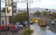 Vehicle crashes into Las Vegas water main, closes lanes