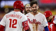 Turner's 2-run single with 2 outs in 10th inning leads Phillies past Braves 3
