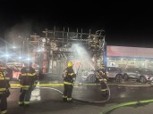Nitro auto dealership damaged in fire