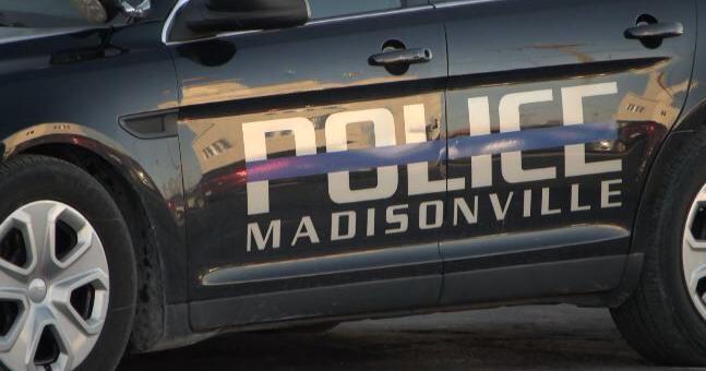 Madisonville man cited after police officer was nearly attacked by multiple dogs Tuesday