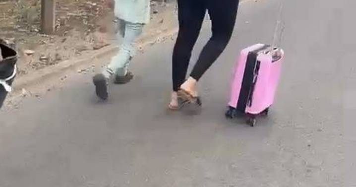 Holidaymakers ditch taxi and walk along motorway in desperate bid to catch flight