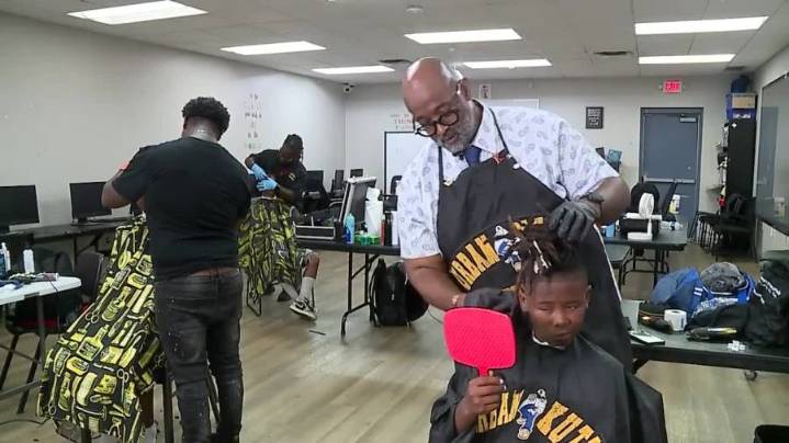 Free haircuts given to kids at apartment complex where explosion happened