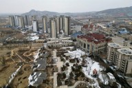 From default to delisting of Evergrande, world's most indebted developer