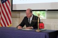 Gov. Polis signs budget cuts sparing state education and public safety
