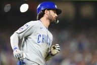 Swanson hits 2 homers, drives in 6 runs to lead Cubs to an 11
