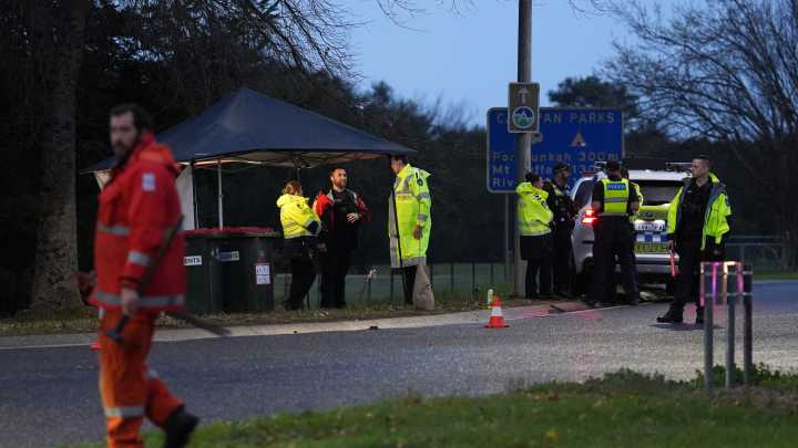 Victoria police shooting: 'Cop killing conspiracy theorist could be hiding in cave' as his family hand themselves in