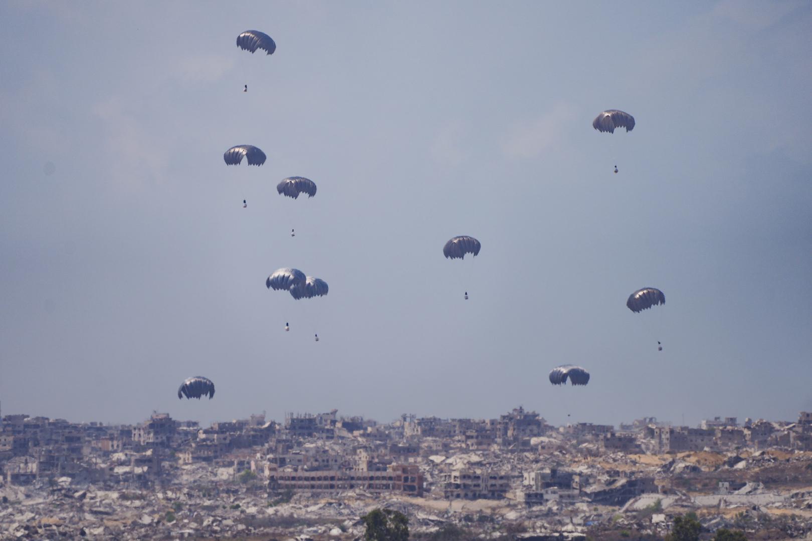 Palestinians rush to get aid from airdrops as Israel's plans to launch new operation in Gaza advance