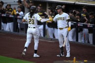 Tatis makes spectacular leaping catch to rob Devers of a home run