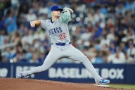 Horton dominates on the mound as Cubs down Blue Jays