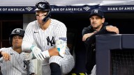 Yankees' Aaron Boone clarifies comment on Aaron Judge's throwing