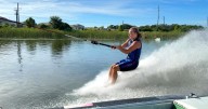 Experts teach families how to barefoot water ski in Winter Haven
