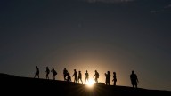 Searing heat draws visitors to California's Death Valley, where it's tough to communicate the risks