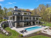 Look inside $5.5M custom home with three-story atrium, secret theater room in Holland