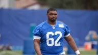 Eagles claim OL Willie Lampkin, re-sign LS Charley Hughlett