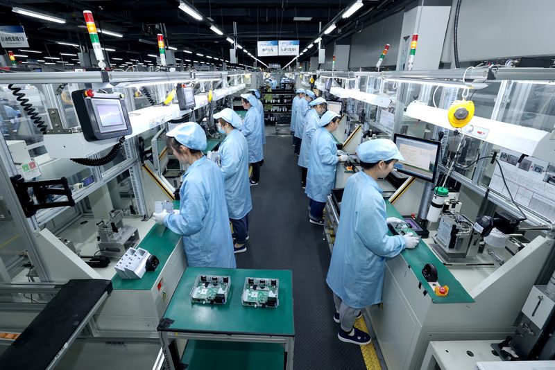 China's factory output, retail sales growth slump in blow to economy