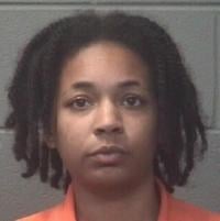 Woman charged with setting boyfriend's home on fire