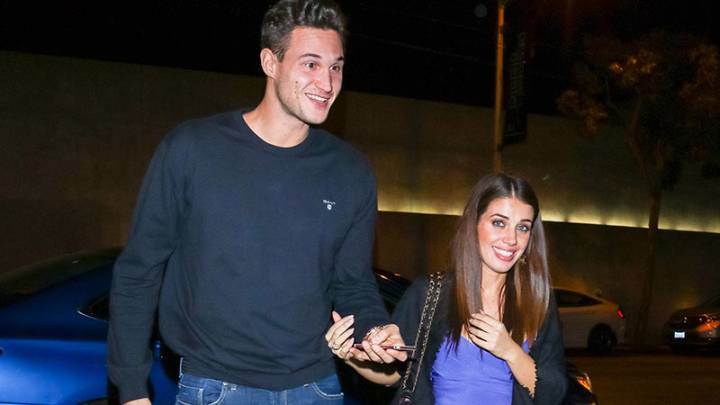 Former NBA player's pregnant wife says she was attacked by shark