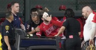 Angels' Taylor Ward carted off field after crashing into scoreboard